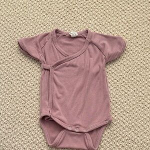 Kate Quinn Ribbed Dusty Pink Baby Bodysuit